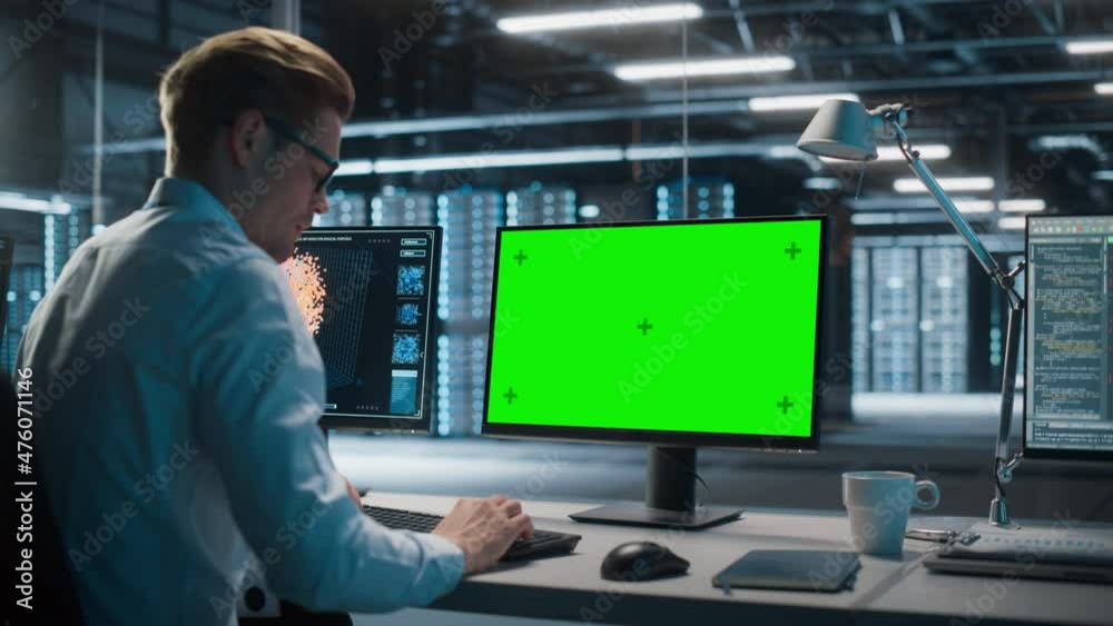 Poster High-Tech Data Center Server: Caucasian Male IT Specialist Working on Green Screen Chroma Key Computer. Monitoring Web Services, Cloud Computing, Analytics Facility, Maintenance of Cyber Security