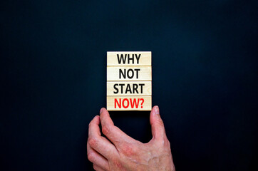 Why not start now symbol. Concept words Why not start now on wooden blocks. Businessman hand. Beautiful black table, black background, copy space. Business and why not start now concept.