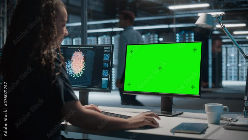 Fototapete High-Tech Data Center Server: Black Female IT Specialist Working on Green Screen Chroma Key Computer. Monitoring Web Services, Cloud Computing, Analytics Facility, Maintenance of Cyber Security