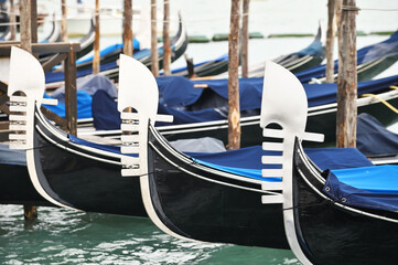 Fototapeta na wymiar Noses of gondolas, Venice