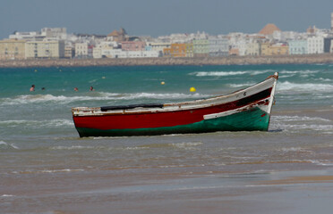 A wooden boat, a patera, was abandoned by illegal migrants at the coast of Cadiz, Spain.