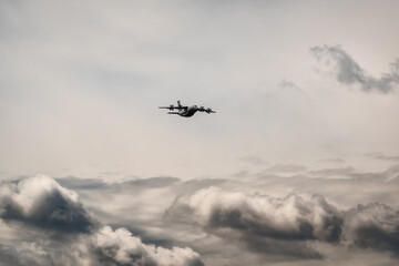 Fototapeta na wymiar military plane in the sky