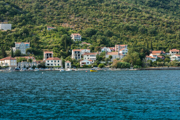 Fototapeta na wymiar Bay of Kotor, view from the sea to the old town of Herceg Novi in Montenegro, Europe, Adriatic Sea and mountains