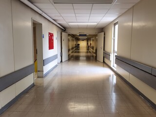 hospital corridor people in queue waiting in an office