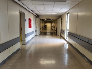 hospital corridor people in queue waiting in an office