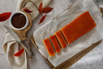 Turron de yema. Delicious handmade nougat toasted egg yolk with hot chocolate. Typical Spanish Christmas sweet