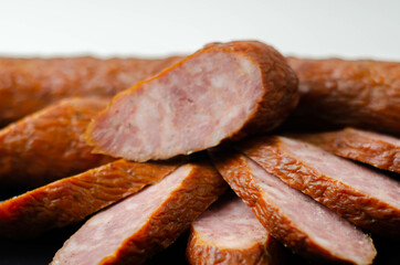 Traditional Polish sausage cut into slices, typical delicatessen product from Eastern Europe