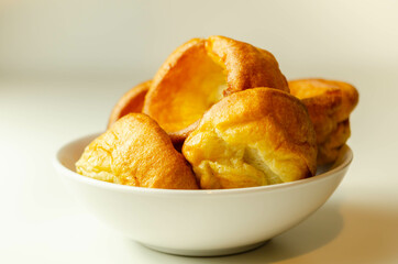 Traditional English Yorkshire pudding, wonderfully crisp and golden baked for a traditional recipe, accompaniment for the perfect Sunday roast