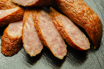Traditional Polish sausage cut into slices, typical delicatessen product from Eastern Europe
