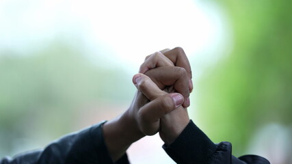 Fototapeta premium Close-up hands together joining forces, support diversity concept