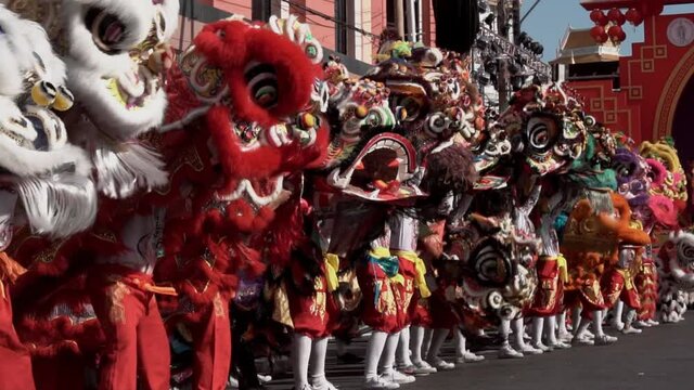 Group of Chinese lion performing during Lunar new year festival in Chinatown.