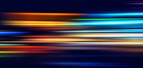 Abstract Rainbow light trails on the dark blue background. Motion blur illustration design.