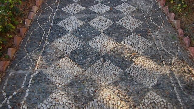 public garden with Arabic style stone floor, in Almu&ntilde;ecar, Granada, Andalusia, Spain