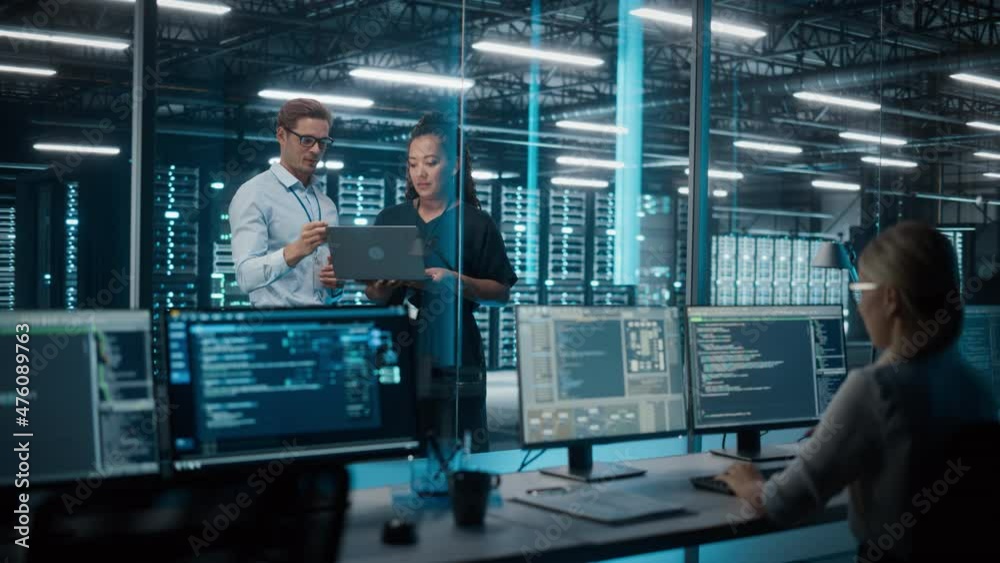 Aufkleber big data center server room: female e-business enrepreneur and male it specialist talk, use laptop. 