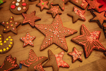 Colorful gingerbread cookies on wooden table 