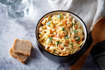 Coleslaw, cabbage cucumber corn carrot salad with greek yogurt dressing in a bowl