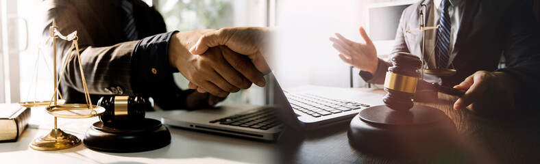 Attorneys or judges sitting at work to sign important documents, attorneys and law, legal concepts of the judiciary and the legislature.