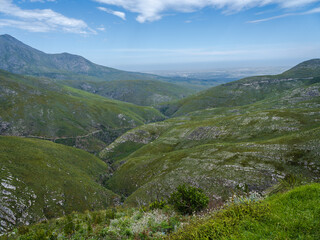 Fototapeta na wymiar Rolling hills and mountain on Outeniqua in George South Africa