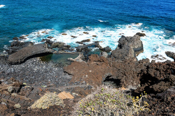 Rocky beach and crystal clear water on El Hierro island. Canary Islands.