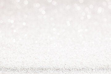 sparkles of Silver glitter abstract background. Copy space