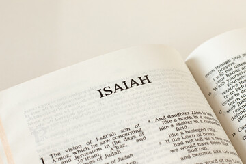 Open Holy Bible Isaiah prophet Book Old Testament Scripture on white background. Christian biblical...