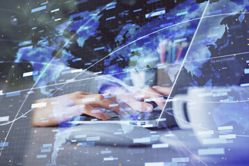 Double exposure of woman hands working on computer and data theme hologram drawing. Tech concept.