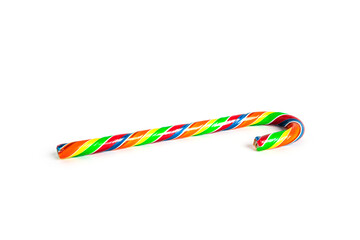 A colored Christmas candy cane isolated on a white background.