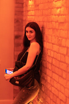 Girl in red corridor on red lighting sexy