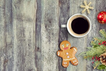 Cookie gingerbread and cup of coffee or tea festive table party new year gift Christmas table.