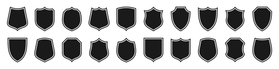 Fototapeta Set of various vintage shield icons. Black outlined heraldic shields. Protection and security symbol, label. Vector illustration. obraz