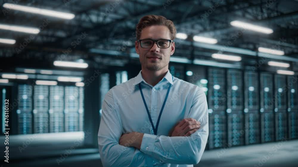 Poster Big Data Center Portrait of Smiling Chief Technology Officer Wearing Glasses Walks into Focus, Looks at Camera. Cloud Service Warehouse with System Administrator. SAAS, Cloud Computing, Cyber Security