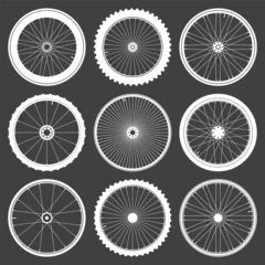 Fotobehang White bicycle wheel symbols collection. Bike rubber tyre silhouettes. Fitness cycle, road and mountain bike. Vector illustration. © 32 pixels