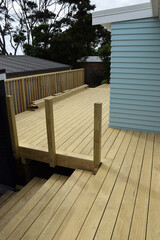 A brand new deck on a residential home awaiting oiling or staining