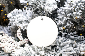 Blank Round Christmas Ornament Mockup over Christmas tree background
