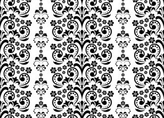 Wallpaper in the style of Baroque. Seamless vector background. White and black floral ornament. Graphic pattern for fabric, wallpaper, packaging. Ornate Damask flower ornament