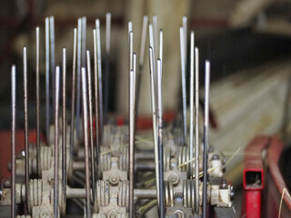 Selective focus shot of reamer nails used in construction - obrazy, fototapety, plakaty