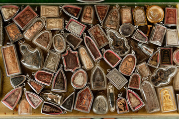 Collage of handmade pendants. Bangkok, Thailand