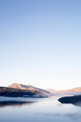 Loch Lomond aerial view at winter with low clouds near Tarbet