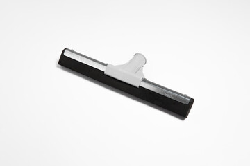 Window glass squeegee isolated on white background. Window cleaning brush.High-resolution photo.Top view. Mock-up.