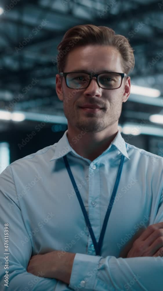 Poster vertical screen. data center portrait of smiling chief technology officer wearing glasses walks into