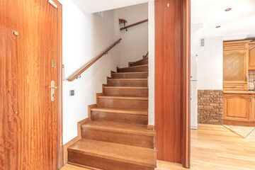 Stairs to the second floor of a duplex apartment for vacation rental