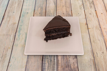 The chocolate cake is an internationally known dessert, which became popular in the late 19th century and is frequently served at gatherings such as birthday parties and weddings.