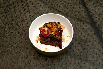 The chocolate cake is an internationally known dessert, which became popular in the late 19th century and is frequently served at gatherings such as birthday parties and weddings.