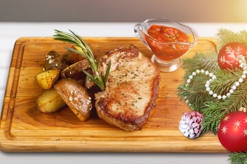 Christmas Meat dish with rosemary. The delicious festive dish for Christmas time.