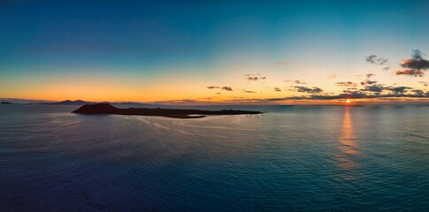 Beautiful panoramic view of the sunrise over Isla de Lobos island Corralejo Fuerteventura © Dave