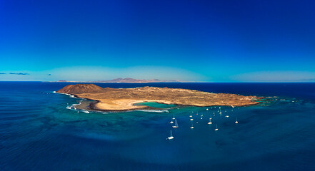 Fototapeta na wymiar Beautiful high aspect aerial panoramic image of Lobos Island Corralejo Fuerteventura