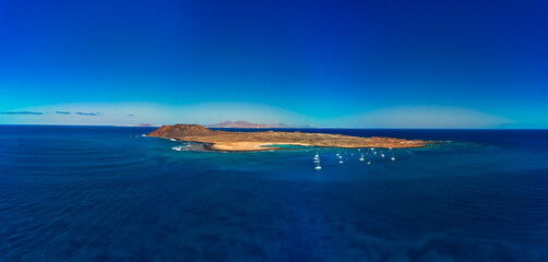 Beautiful high aspect aerial panoramic image of Lobos Island Corralejo Fuerteventura