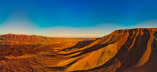 Dramatic panoramic image of the volcanic mountain landscape of Fuerteventura