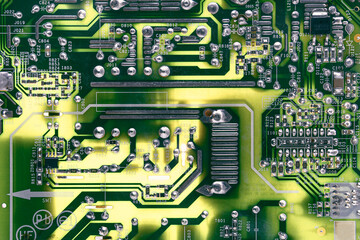 Green board from a computer, close-up. Electronics