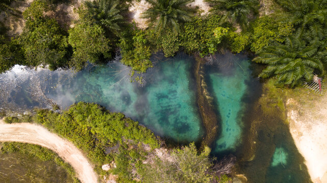 Tadom Hill beautiful crystal clear emerald pool during sunrise
